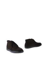 Полусапоги и высокие ботинки Tod's