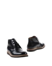 Полусапоги и высокие ботинки Common Projects