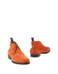 Полусапоги и высокие ботинки Santoni