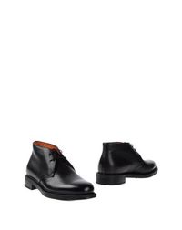 Полусапоги и высокие ботинки Santoni