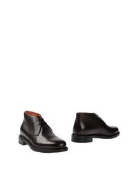 Полусапоги и высокие ботинки Santoni