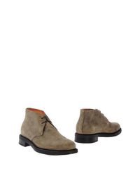 Полусапоги и высокие ботинки Santoni