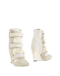 Белые Полусапоги и высокие ботинки Isabel Marant