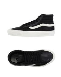 Высокие кеды и кроссовки Vans