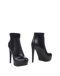 Черные Полусапоги и высокие ботинки Steve Madden