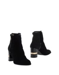 Черные Полусапоги и высокие ботинки Stuart Weitzman