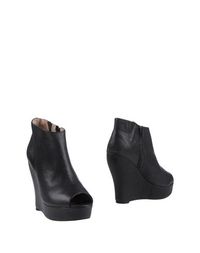 Черные Полусапоги и высокие ботинки Jeffrey Campbell