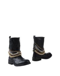 Черные Полусапоги и высокие ботинки Steve Madden