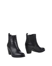 Черные Полусапоги и высокие ботинки Steve Madden