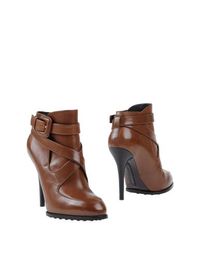 Коричневые Полусапоги и высокие ботинки Tod's