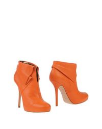 Оранжевые Полусапоги и высокие ботинки Blumarine