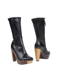 Черные Полусапоги и высокие ботинки MIU MIU
