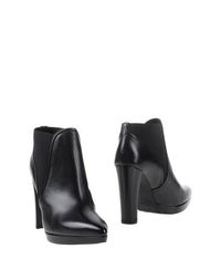 Черные Полусапоги и высокие ботинки Stuart Weitzman