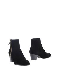 Черные Полусапоги и высокие ботинки Stuart Weitzman