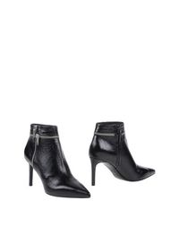 Черные Полусапоги и высокие ботинки Saint Laurent