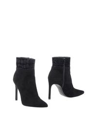 Черные Полусапоги и высокие ботинки Stuart Weitzman