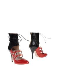 Красные Полусапоги и высокие ботинки MIU MIU