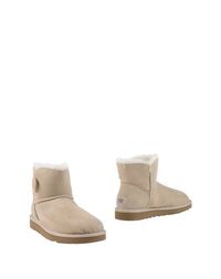 Бежевые Полусапоги и высокие ботинки UGG Australia