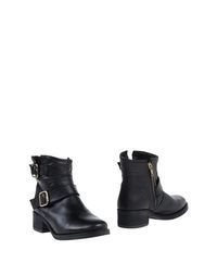 Черные Полусапоги и высокие ботинки Steve Madden
