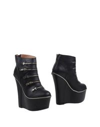 Черные Полусапоги и высокие ботинки Jeffrey Campbell