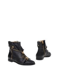 Черные Полусапоги и высокие ботинки Moschino