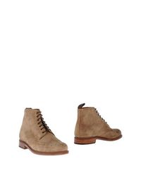 Полусапоги и высокие ботинки Grenson