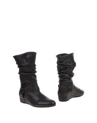 Серые Полусапоги и высокие ботинки Stuart Weitzman