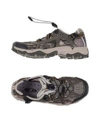 Низкие кеды и кроссовки Salomon