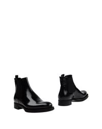 Черные Полусапоги и высокие ботинки Prada
