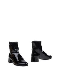 Черные Полусапоги и высокие ботинки Stuart Weitzman