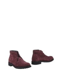 Полусапоги и высокие ботинки Tod's