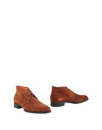 Полусапоги и высокие ботинки Santoni