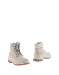 Белые Полусапоги и высокие ботинки Timberland