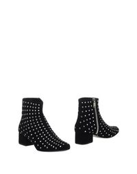 Черные Полусапоги и высокие ботинки Saint Laurent
