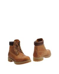 Полусапоги и высокие ботинки Timberland