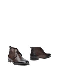 Полусапоги и высокие ботинки Santoni