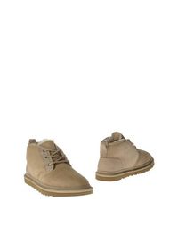 Бежевые Полусапоги и высокие ботинки UGG Australia