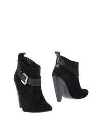 Черные Полусапоги и высокие ботинки Guess