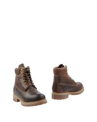Полусапоги и высокие ботинки Timberland