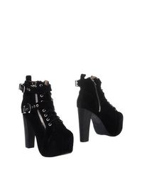 Черные Полусапоги и высокие ботинки Jeffrey Campbell