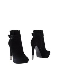 Черные Полусапоги и высокие ботинки Guess