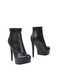 Черные Полусапоги и высокие ботинки Steve Madden