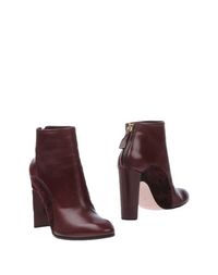 Красные Полусапоги и высокие ботинки Nina Ricci