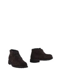 Полусапоги и высокие ботинки Tod's