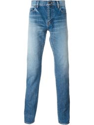 джинсы с потертой отделкой Saint Laurent