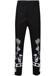 брюки с вышивками в стиле тату Alexander McQueen