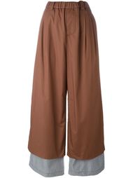 pleated contrast hem palazzo trousers Lucio Vanotti