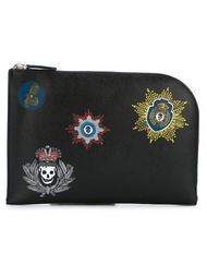 badge print clutch Alexander McQueen