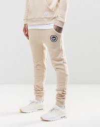 Зауженные спортивные брюки с логотипом Hype - Песок