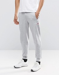 Серые джоггеры с манжетами New Balance EMP53709 - Серый
